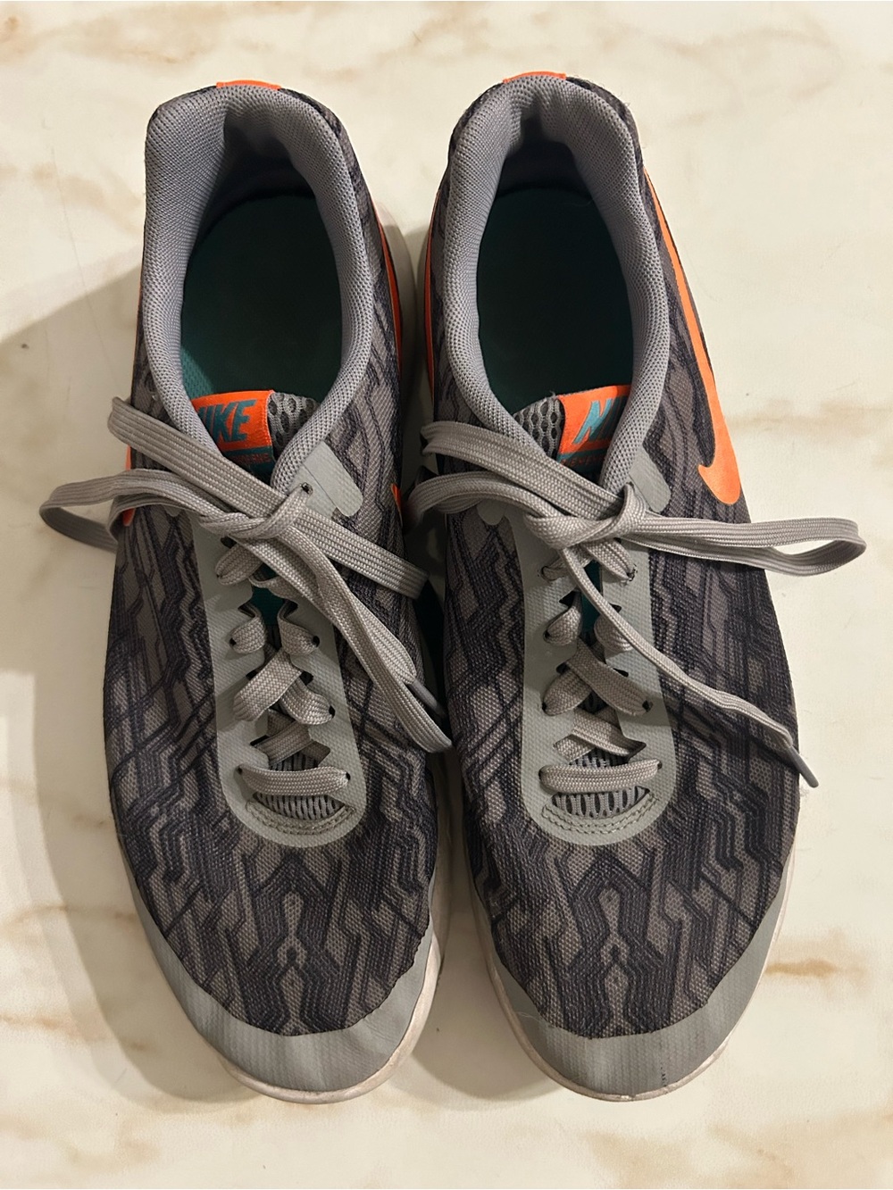 Nike Men's Gray Shoes with Orange Swoosh